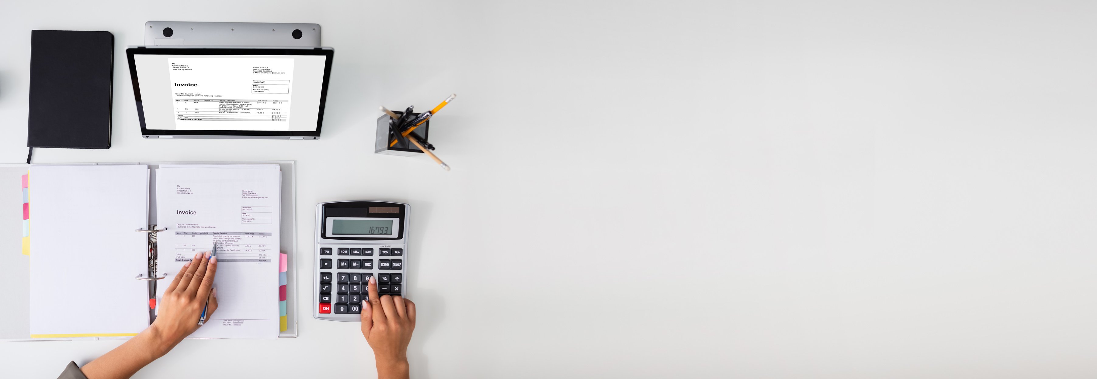 Accountant calculating tax at desk